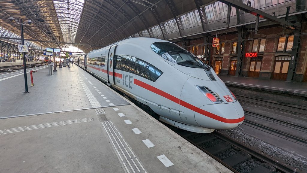A DB ICE train stands at Amsterdam Centraal station.