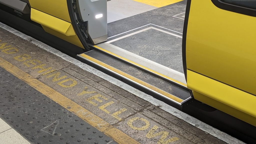 A step extends from the class 777 train to meet with the edge of the station platform, providing level access.